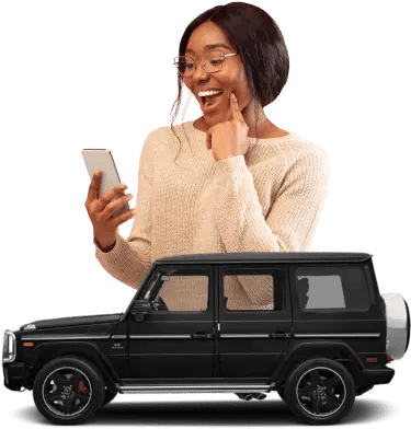 A woman smiling with a car beneath her