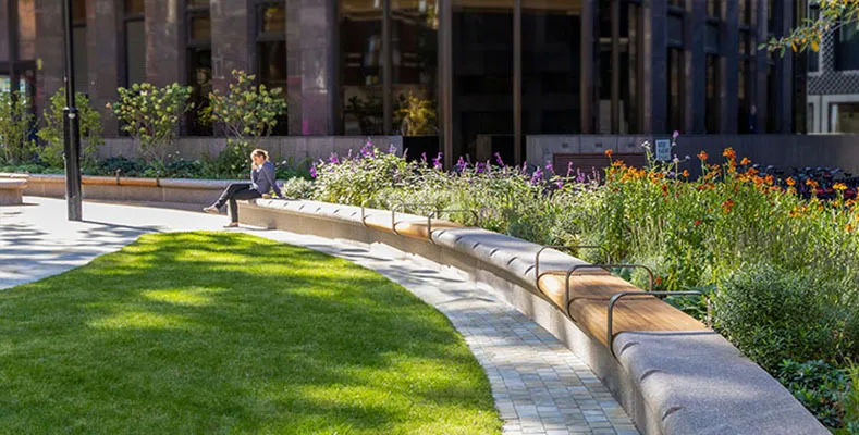 Wall-top seating blends into the environment at Christchurch Gardens