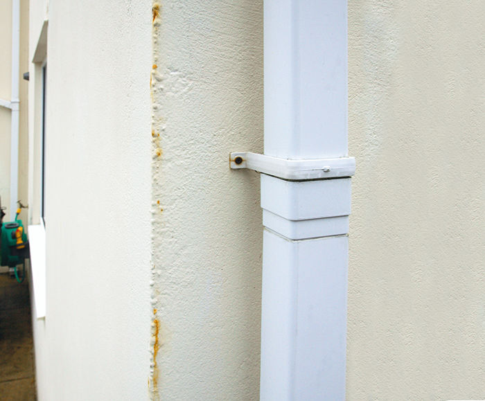 Examples of building render where steel render beads have been used, which has led to rust leaking into the render, causing unpleasant discolouration and damage