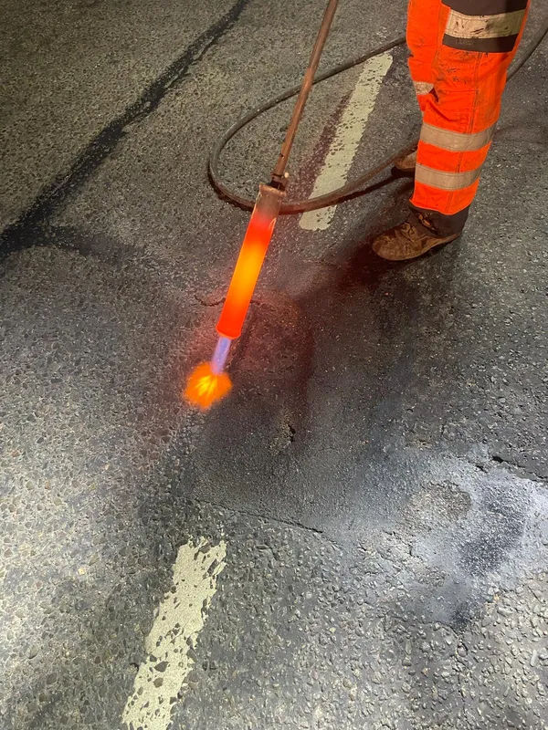 Overbanding seals road cracks to waterproof them, preventing further damage, maintaining road quality and prolonging the need for road surface work