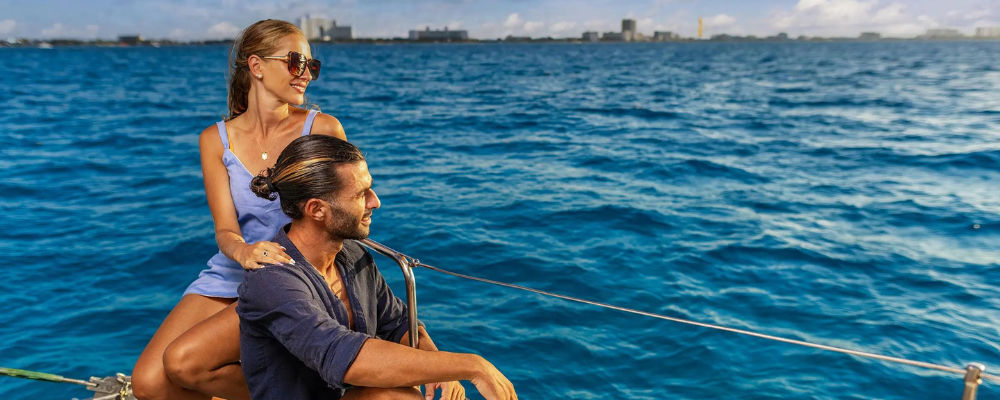 couple in catamaran cancun