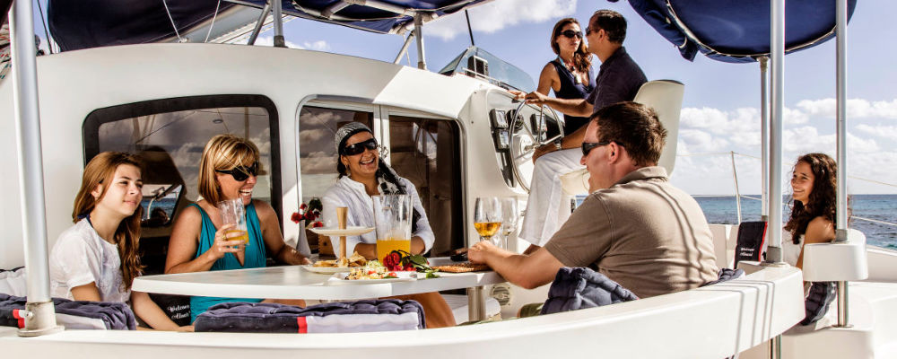 family in catamaran cancun