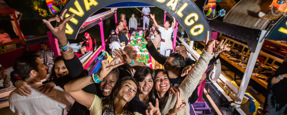 tourists in xoximilco cancun trajineras