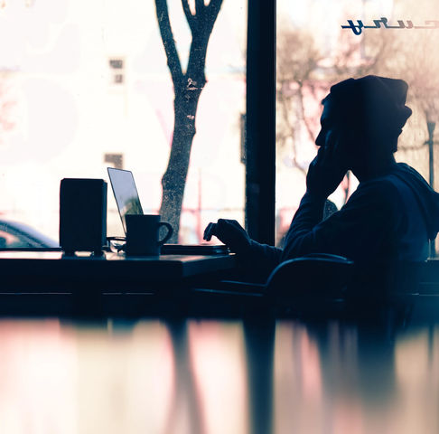 Silhouette woman and laptop