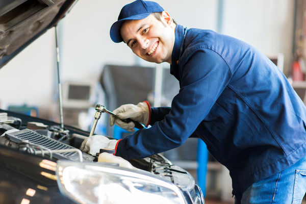 Electrician Working On Car