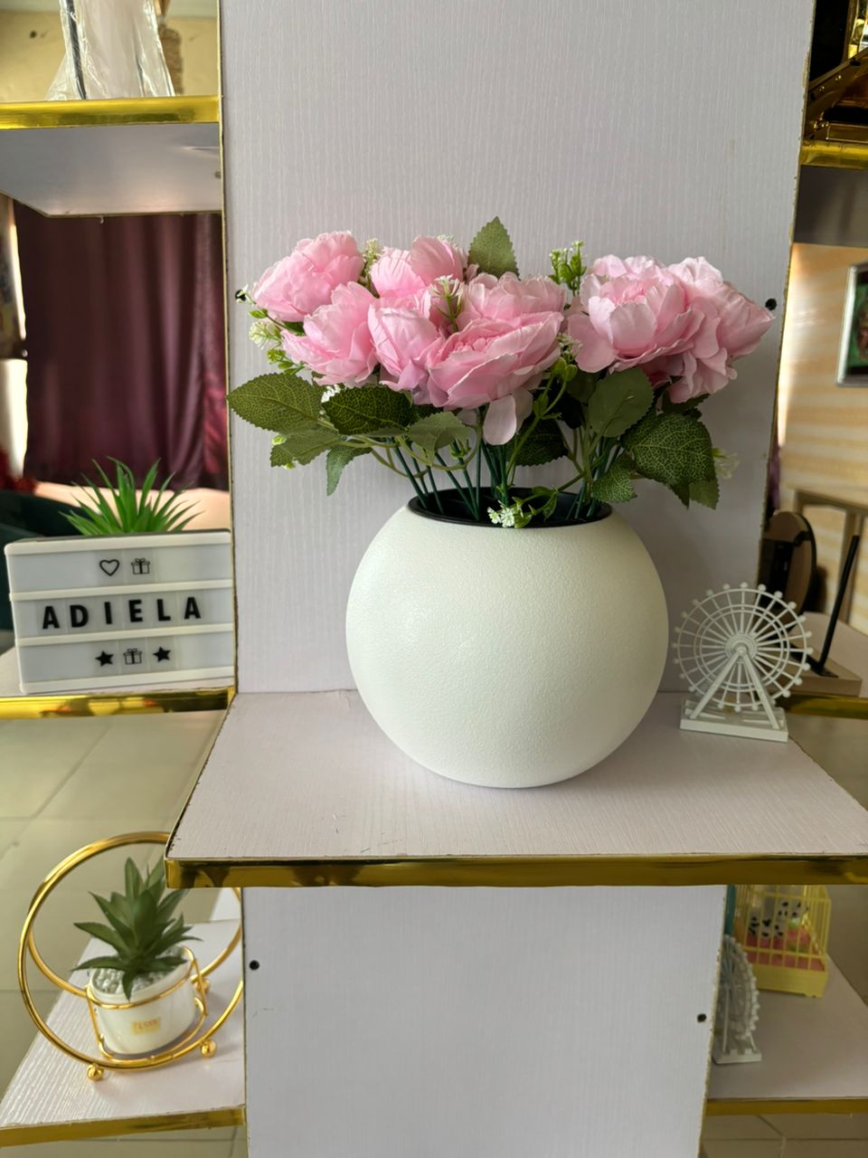 Artificial Flower In Plastic Table Planter Image