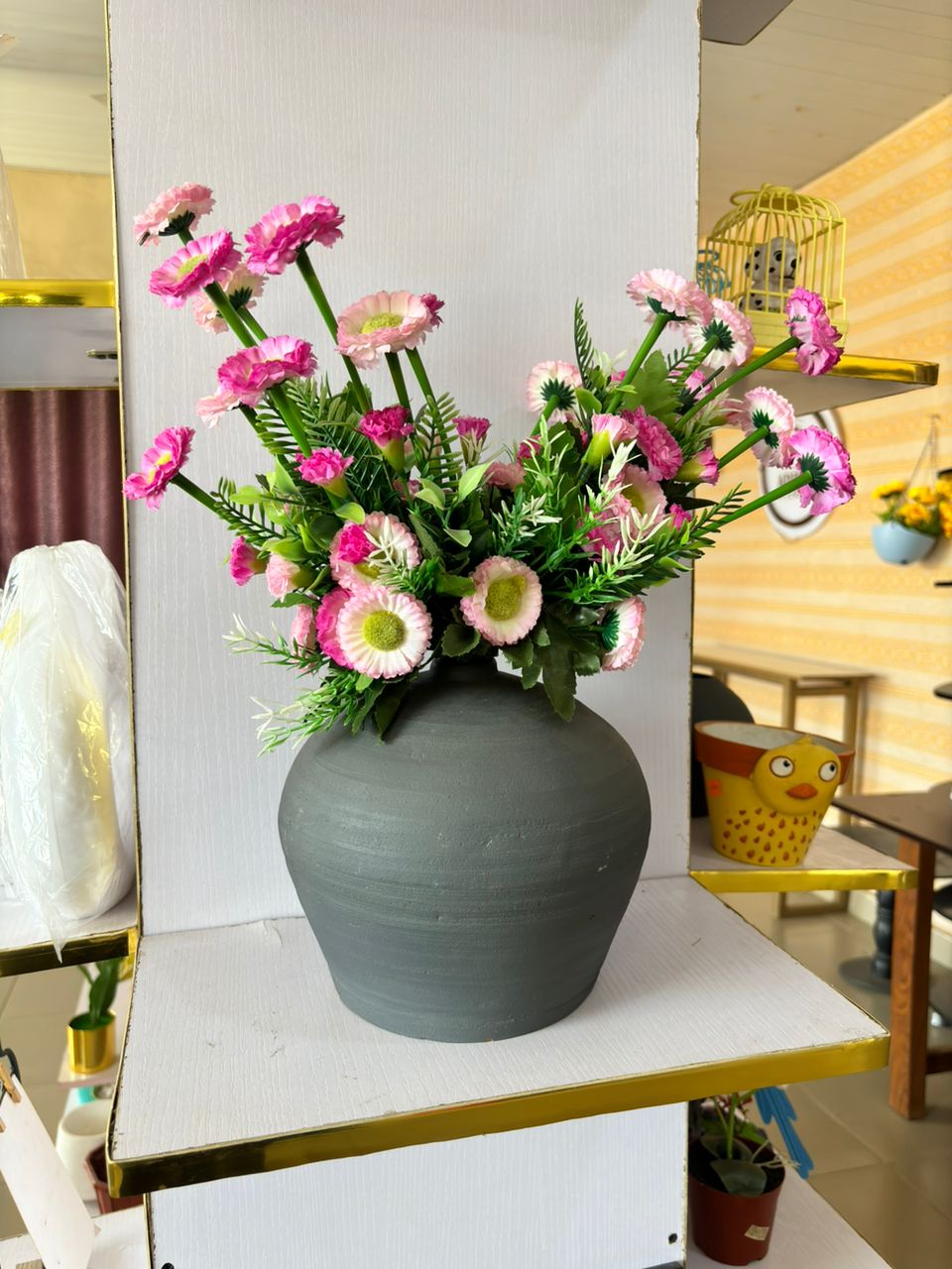 Artificial Flower in ceramic Vase Image