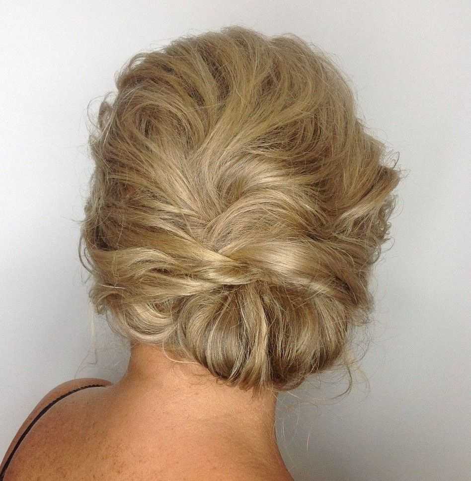 Featured Photo of Tousled Asymmetrical Updo Wedding Hairstyles