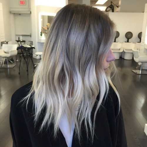 Soft Waves Blonde Hairstyles With Platinum Tips (Photo 20 of 20)