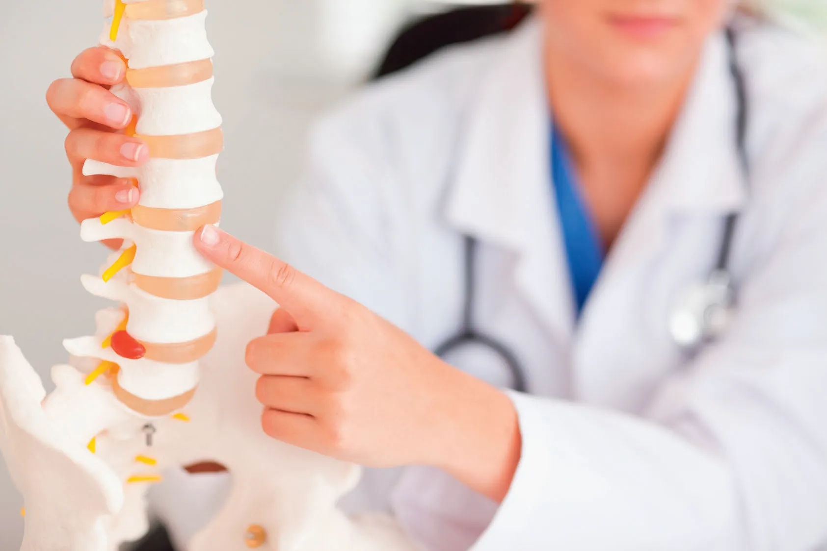 Doctor Showing Neck Spine