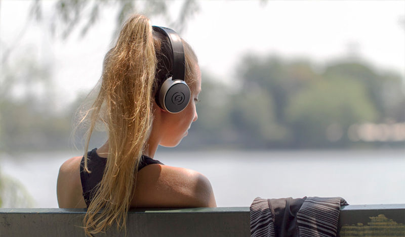 SR450-female-listening-outdoors