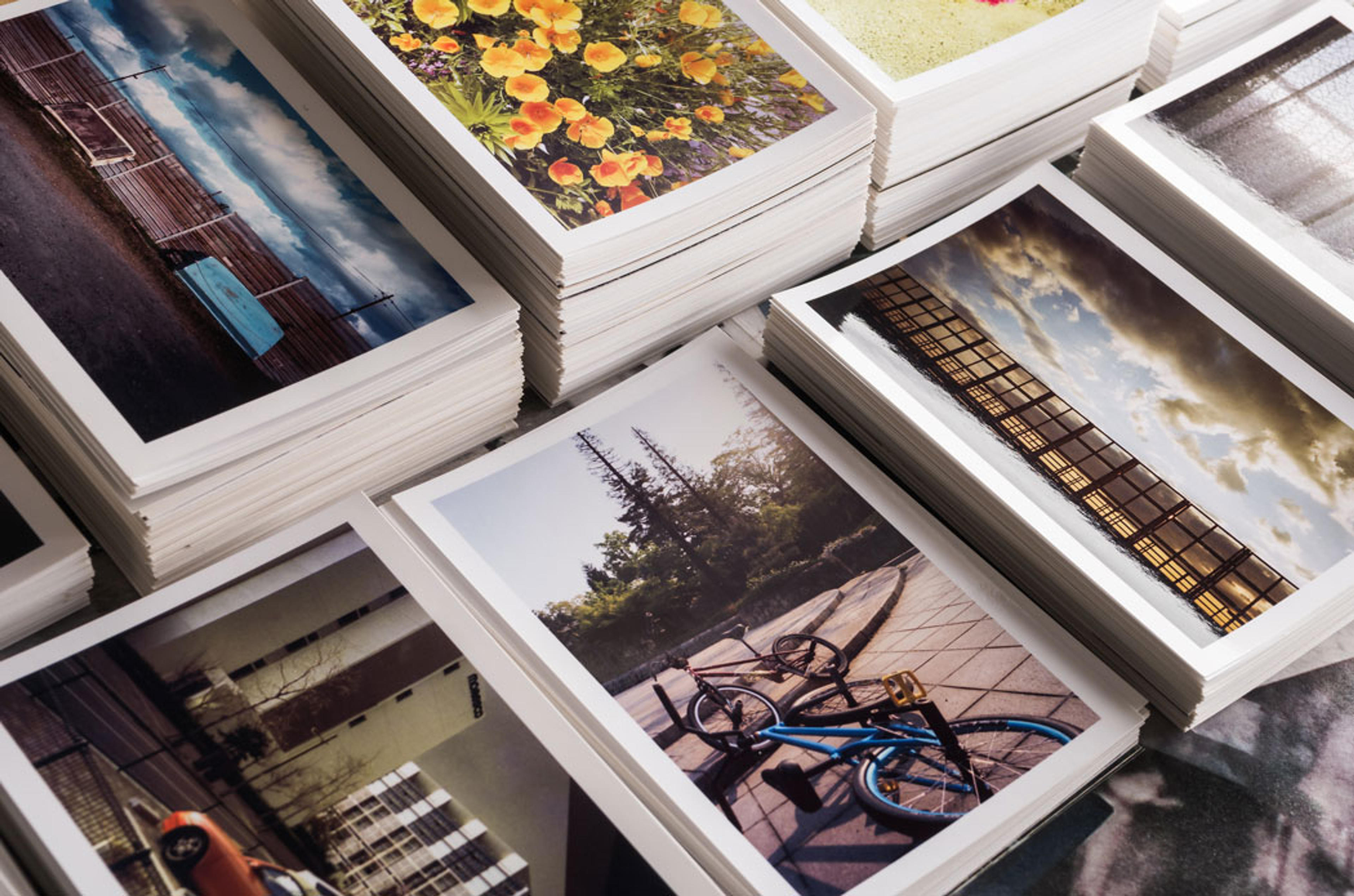 Neatly arranged stacks of photos