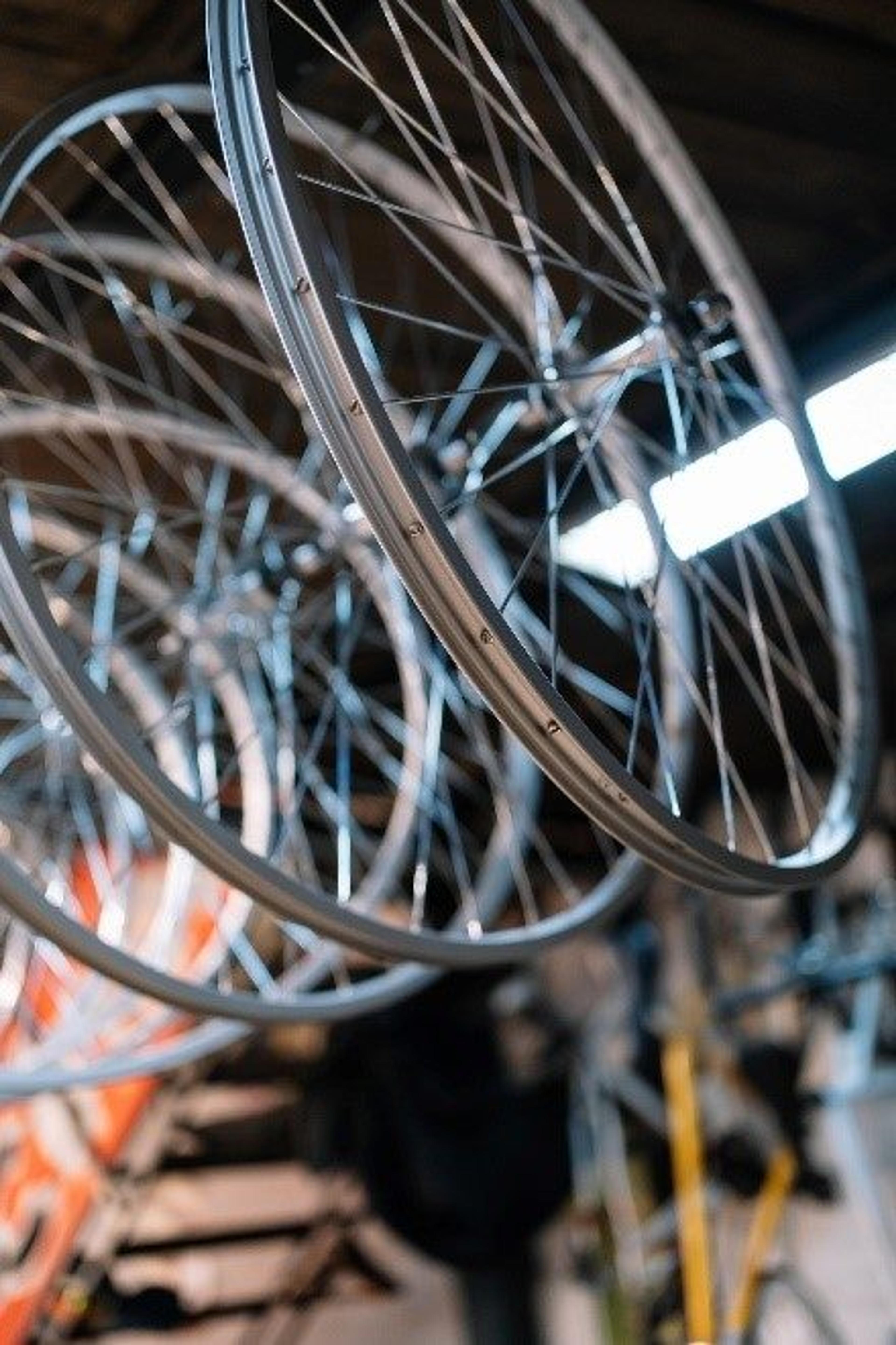 Bikes organized in garage hanging up