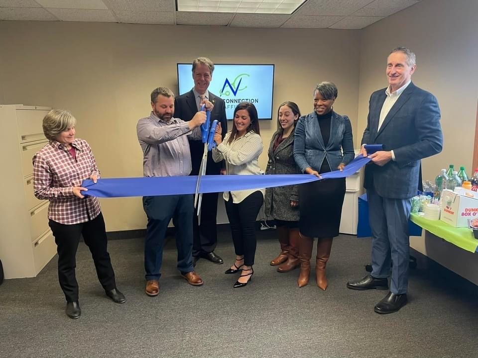 WNY Ribbon Cutting 04-06-2022 - group with scissors