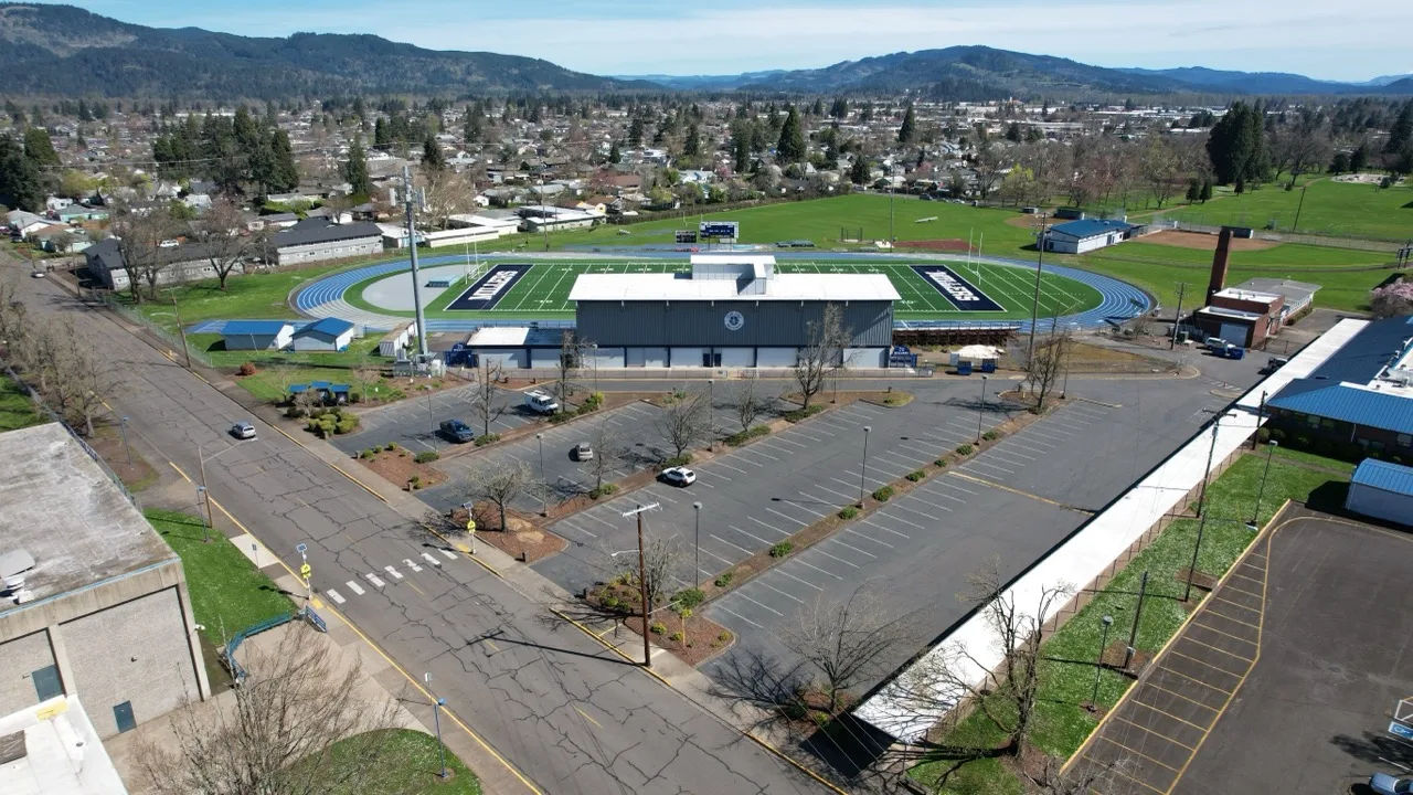 Aerial view of Springfield High School's stadium and surrounding campus in Springfield, Oregon