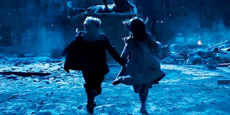 A young Coriolanus and his cousin Tigris run through the streets of the Capitol during the Dark Day in The Hunger Games: The Ballad of Songbirds and Snakes. 