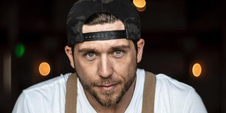 chef adam glick poses for the camera