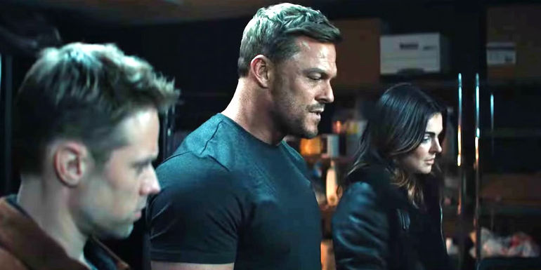 Jack, O'Donnell and Dixon looking at something below in Reacher