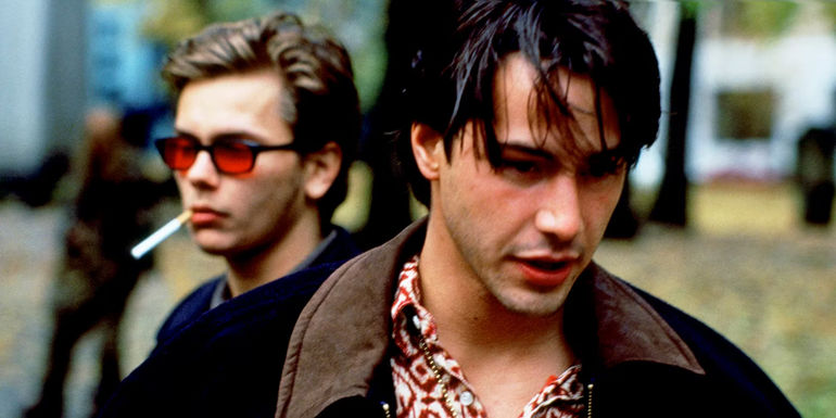 River Phoenix smoking a cigarette and Keanu Reeves in My Own Private Idaho