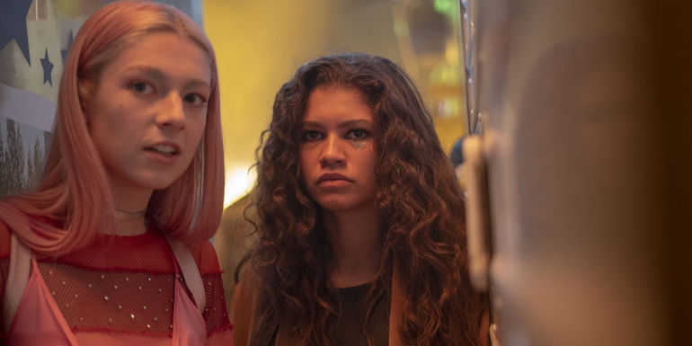 Rue and Jules are standing at a carnival looking at something in the distance in Euphoria. 