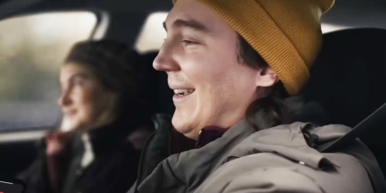 Keith with Caroline driving in Dumb Money