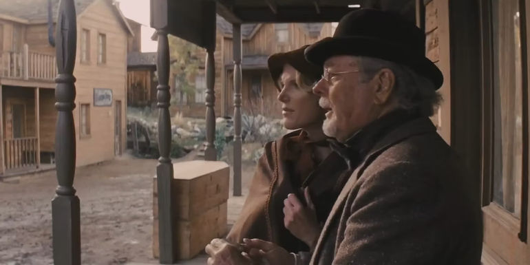 Son of a Gun (Russ Tamblyn) staring in disbelief next to a woman in Django Unchained.