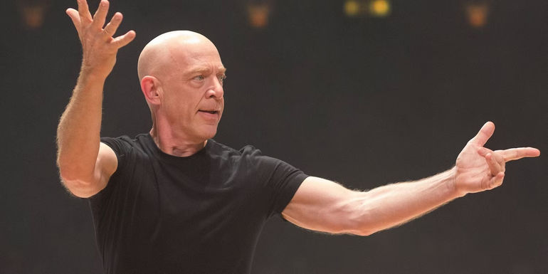 Terence Fletcher (JK Simmons) conducting with intensity in Whiplash