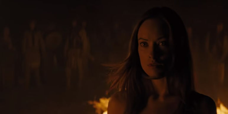 Ella Swenson emerging from the fire in Cowboys and Aliens