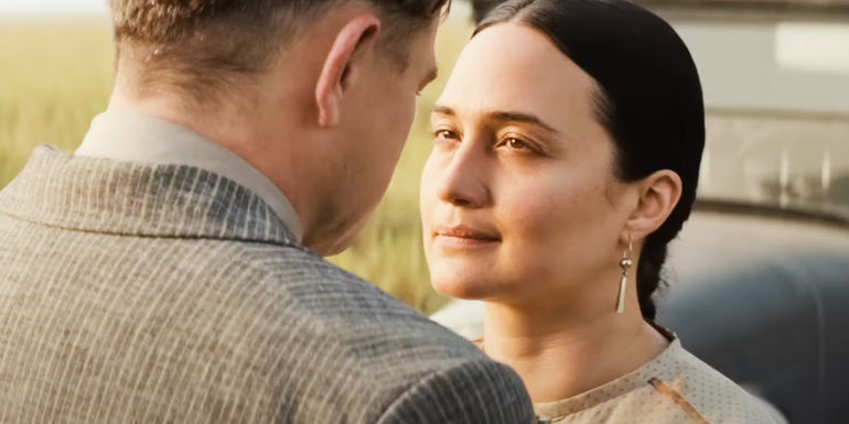 Mollie Burkhart looking lovingly up at Ernest in Killers of the Flower Moon