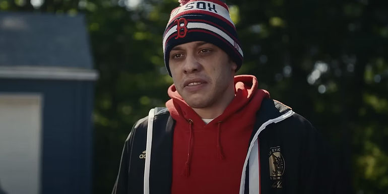 Pete Davidson in a toque in Dumb Money
