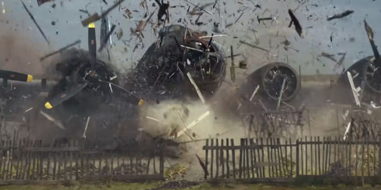 A bomber bursts through a fence in Masters of the Air