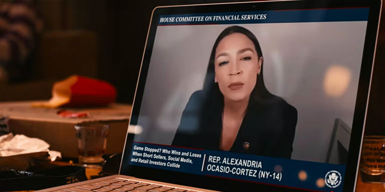 A computer screen shows Representative Alexandria Ocasio-Cortez during the Congressional hearing in Dumb Money