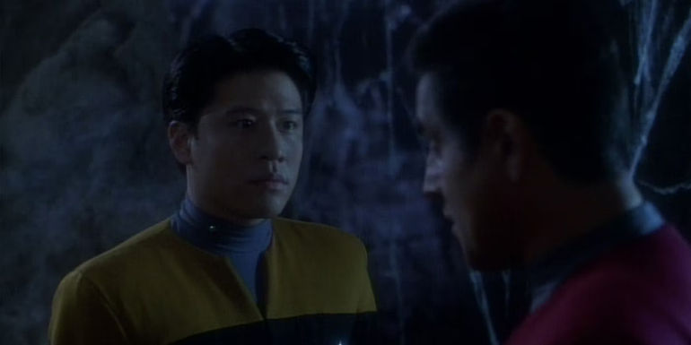 harry kim talks to chakotay in a dark cave in voyager emanations