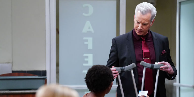 Rob Huebel as Pellino holding crutches in Night Court 204 Hold the Pickles, Keep the Change