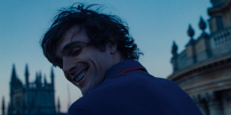 Jacob Elordi as Felix Catton looking behind him in Saltburn