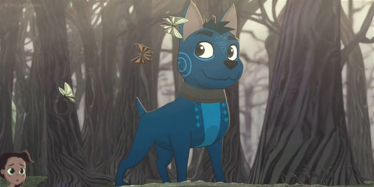 Xico the dog smiles at butterflies in the forest.