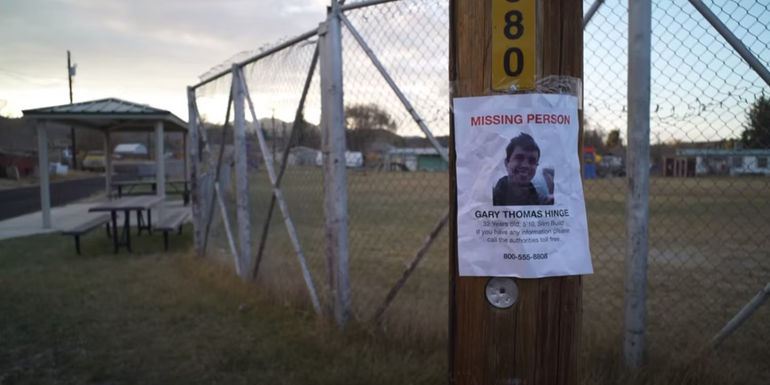 A missing person notice for Gary hangs on an outdoor pole in Horror in the High Desert