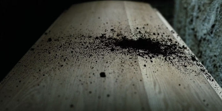 Dirt rises off of Superman's coffin at the end of Batman V Superman