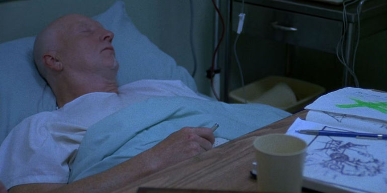 Johnn Kramer in a hospital bed in Saw
