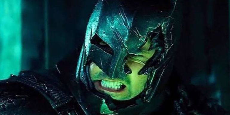 Batman preparing to stab Superman but confused by him saying Martha