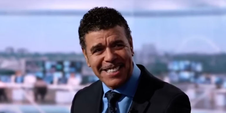 Chris Kamara smiling on Ted Lasso.