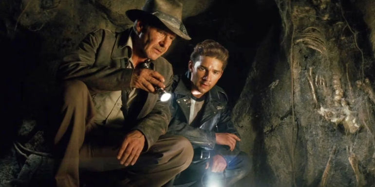 Harrison Ford and Shia LaBeouf look down at something in Indiana Jones and the Kingdom of the Crystal Skull.