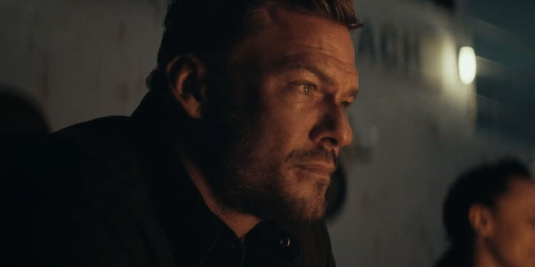 Alan Ritchson looking stern as Reacher