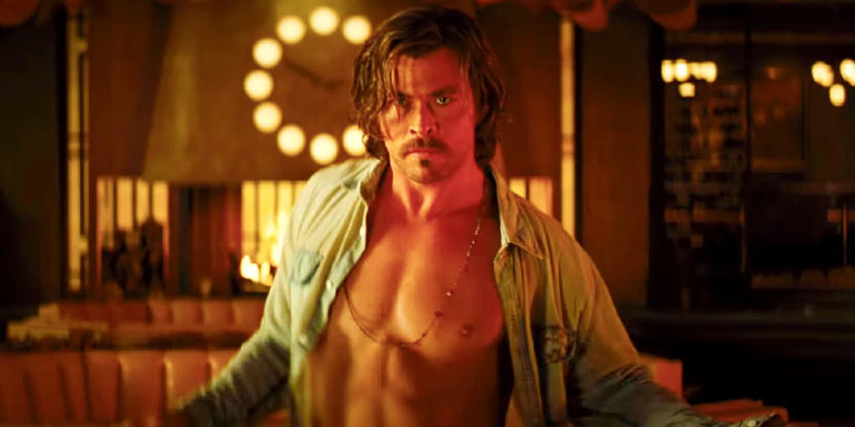 Chris Hemsworth with his shirt unbuttoned in Bad Times at the El Royale.