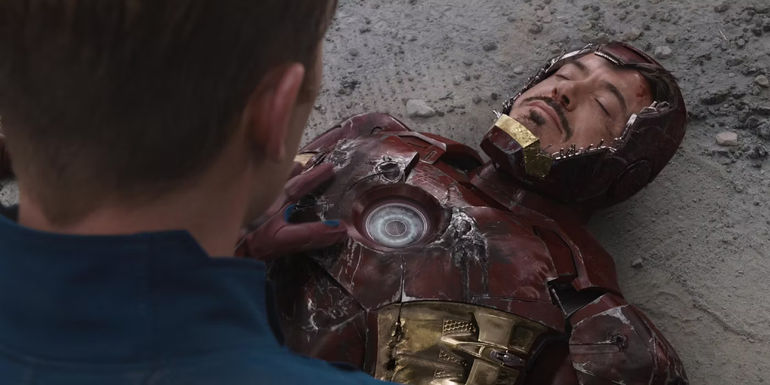 Robert Downey Jr. as Iron Man lying unconscious in The Avengers (2012)