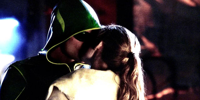 Lois and Clark kiss while he is dressed as Green Arrow in Smallville