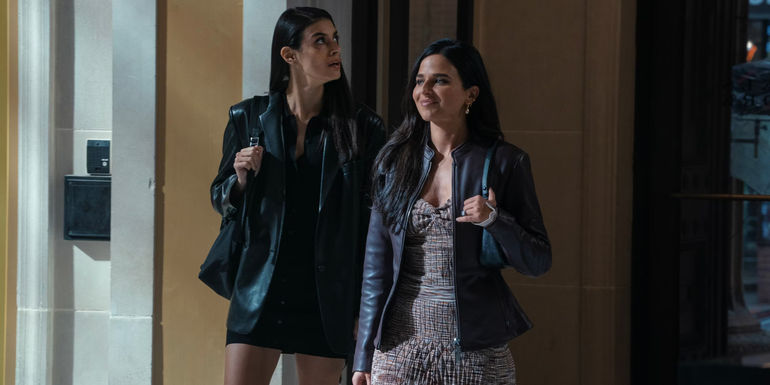 Two characters looking around a building in Special Ops Lioness 