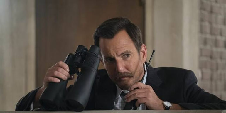 Terry Seattle talks to an undercover Ken Jeong in Murderville.