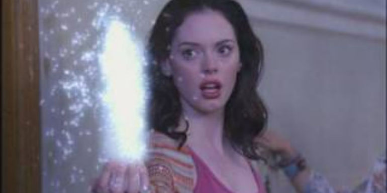 Paige Orbs a Candle into Her Hand with a Shocked Look on Her Face in Charmed Season 4