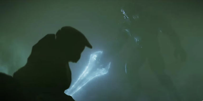 Master Chief in silhouette looking at an Elite with an energy sword in Halo season 2
